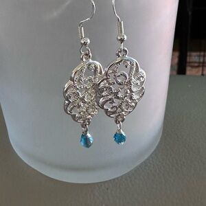 Intricate Silver Earrings with Blue Accent
